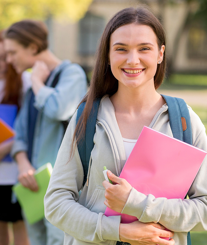 Two students walking together on campus